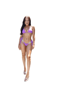 a woman in a purple bikini posing